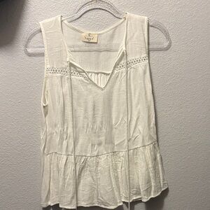Cream Smocked Peplum Sleeveless Blouse